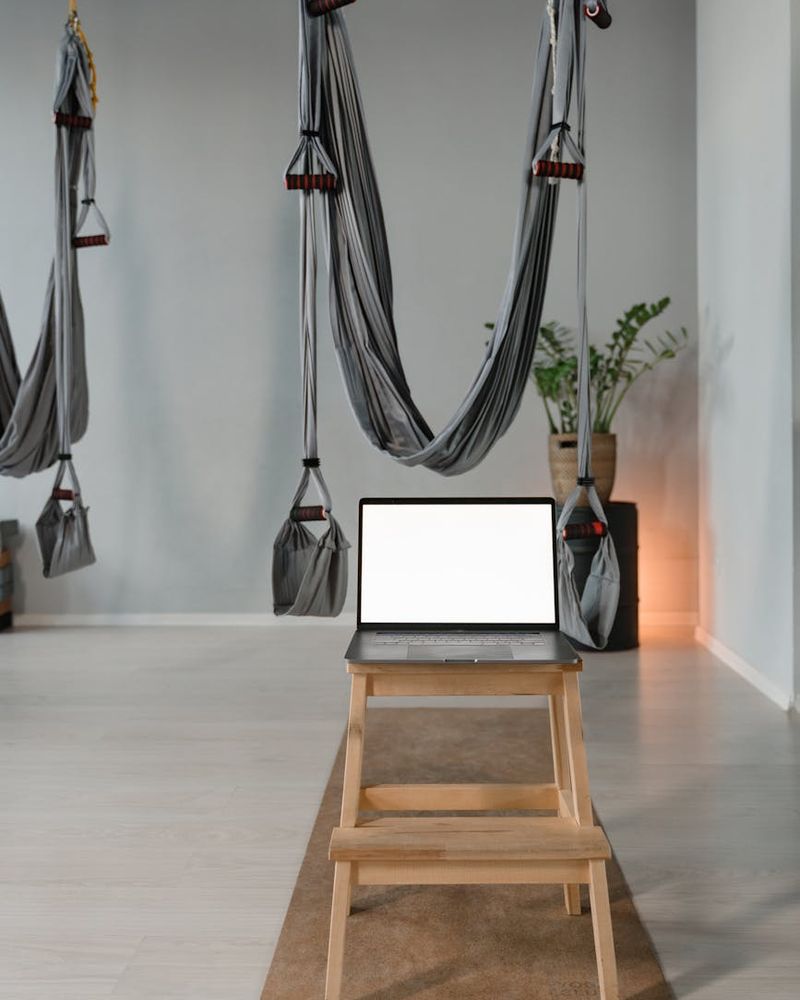 Professional gym equipment in a dark atmospheric studio space